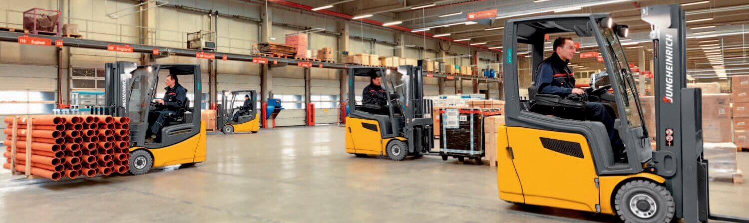 Forklift fleet working in warehouse