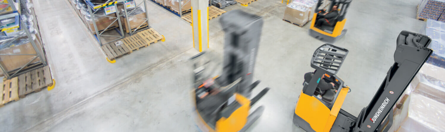 Multiple Jungheinrich Forklifts Operating in Narrow Aisles
